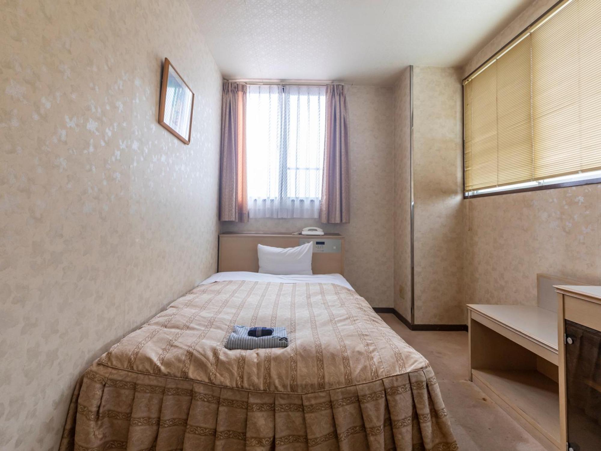 Tabist Annex Matsumi Hotel Beppu Room photo